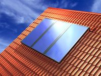 Kolektor słoneczny na dachu budynku