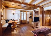 Pokój dzienny na parterze w domu w Cortina d' Ampezzo